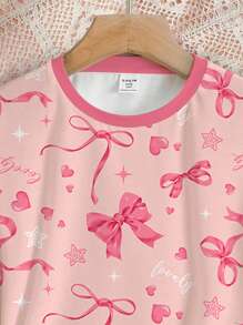 SHEIN Pijama minimalista informal de manga corta y pantalón para niñas preadolescentes, con moño rosa dulce y estampado en inglés, de ajuste ceñido, para primavera y verano
