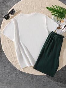SHEIN 2pcs Tween Boy Vacation Casual Tropical Floral Print Short Sleeve Top And Shorts Set
