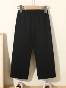 1 pièce Leggings décontractés pour jeune fille avec imprimé graffiti à la mode, slogan et motif dessin animé. Vêtements confortables pour les vacances des filles