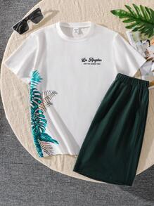 SHEIN 2pcs Tween Boy Vacation Casual Tropical Floral Print Short Sleeve Top And Shorts Set