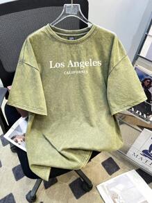 Manfinity Hypemode Camiseta holgada de manga caída mezcla de colores verde oliva con gráfico minimalista de Los Ángeles