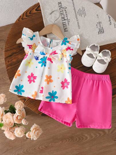 女婴度假休闲花卉印花盖袖上衣和短裤套装