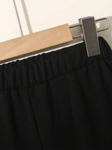 1 pièce Leggings décontractés pour jeune fille avec imprimé graffiti à la mode, slogan et motif dessin animé. Vêtements confortables pour les vacances des filles