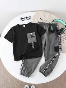 SHEIN 2pcs/Set Young Boy Solid Color Patchwork Crew Neck Short Sleeve Pocket Tee + Long Pants Outfit