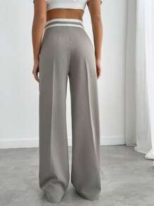 Pantalón de pierna ancha con bordado y detalles en el cinturón para mujer