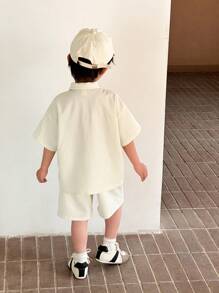 SHEIN Leap Crew 2件装 青春男童 男孩休闲运动 学院街头 日韩 宽松翻领衬衫短裤 适合儿童装 青春男童衣服 返校男童套装 适合生日派对、晚会、演出、婚礼、洗礼、开幕式 日常 适合日常使用 适合上学 适合旅行 适合运动 适合春夏季节 - 杏色 - 查看 5