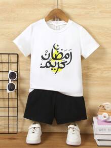 SHEIN 2 Summer Toddler Sets: 1 White Short Sleeved T-Shirt Paired With Black Sports Shorts. Suitable For Daily Wear, Vacation, School, And Sports
