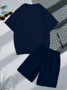 Manfinity Dauomo Men's Solid Color Patchwork Short Sleeve Numeric Print Simple Top And Shorts Set