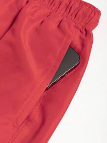 Manfinity Swimmode Shorts de playa casuales y sencillos de unicolor para hombre, uso diario de moda - Rojo - Ver 7