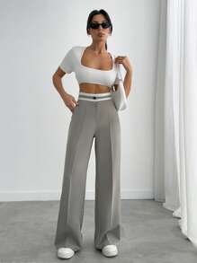 Pantalón de pierna ancha con bordado y detalles en el cinturón para mujer