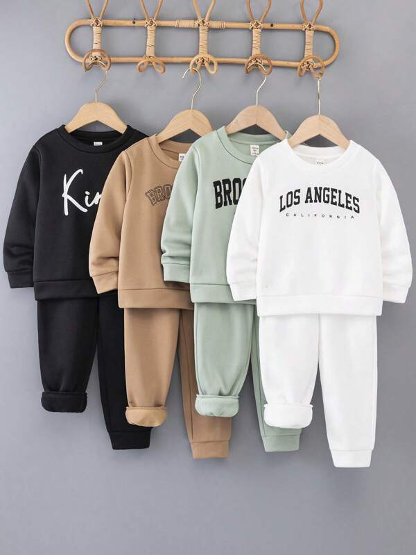 SHEIN 8 peças de roupas infantis para meninos, casuais, de cor sólida e estampa de letras, preto e branco, cáqui, verde, manga comprida, moletom com capuz e calças com cordão, uniforme escolar, pacote múltiplo de roupas para ocasiões de outono/inverno (escola, jardim, praia, aniversário, chá de bebê) adequado para outono/inverno, manter aquecido, faculdade/uso diário e esportes, estilo versátil e simples, adequado para a escola, adequado para passeios, adequado para a temporada de volta às aulas