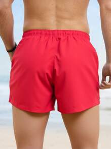 Manfinity Swimmode Shorts de playa casuales y sencillos de unicolor para hombre, uso diario de moda - Rojo - Ver 2