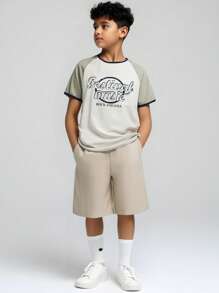 SHEIN Set de 2 piezas para niños mayores que incluye camiseta de manga corta con estampado vintage americano y pantalones cortos casuales a juego