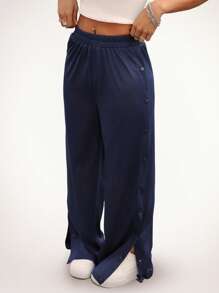 Hanevo 纽扣门襟开衩侧宽松镂空女式长裤