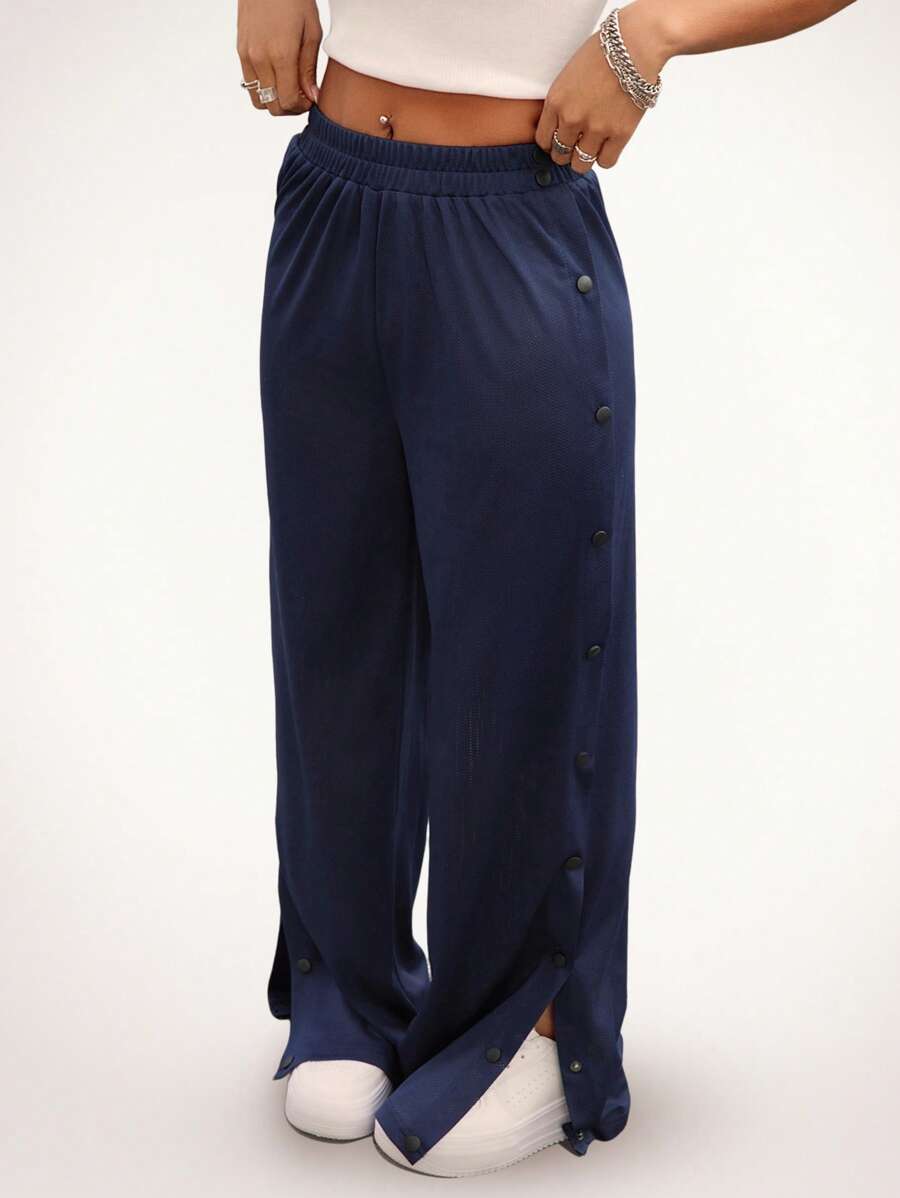 Hanevo 纽扣门襟开衩侧宽松镂空女式长裤