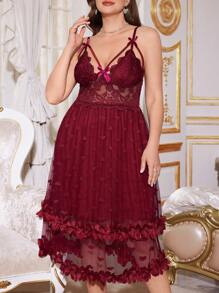 Camisón de talla grande con cuello en V profundo, decoración de moño y dobladillo doble