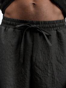 Maija Shorts informales de pierna ancha con bolsillo y cinturón de unicolor para hombre - Negro - Ver 4