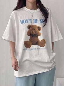 DAZY T-shirt femme ample d'été à imprimé ours de dessin animé avec col rond et épaules tombantes. "N'AYEZ PAS PEUR S'IL VOUS PLAÎT FAITES-MOI ME SENTIR SEUL" Hauts mignons Oversize T-shirt