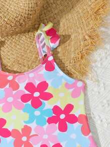 Traje de baño una pieza con falda cubrembreras y volantes con estampado floral para niña, patrón impreso al azar