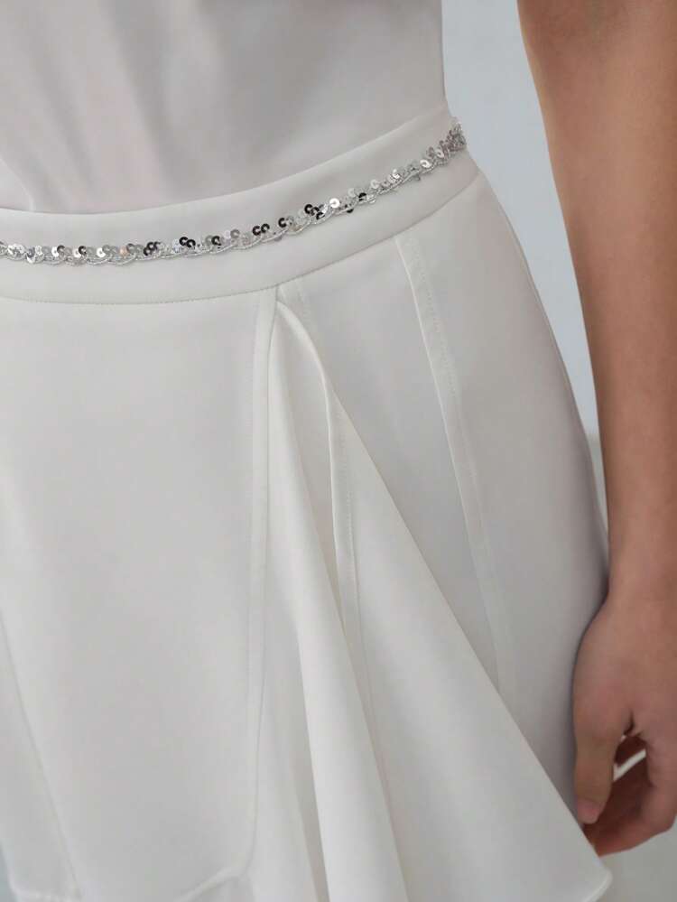 ASYMMETRICAL RUFFLE HEM SKIRT