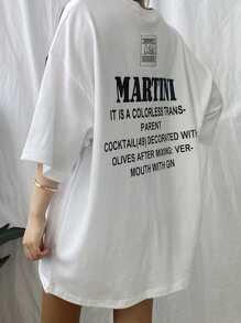 DAZY Camiseta suelta de verano para mujer, con estampado de eslogan, hombros caídos y cuello redondo. Es un cóctel transparente y sin color decorado con aceitunas después de mezclar vermut con ginebra. Camiseta oversize con estampa gráfica