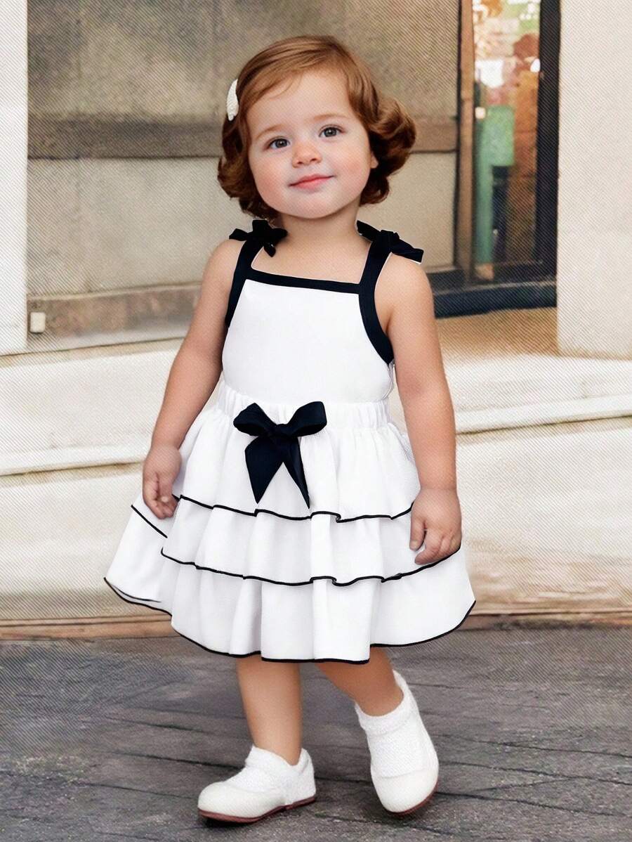 2 Stücke/Set Baby Mädchen Kleinkind 0-3 Jahre Frühling/Sommer Mode elegantes schwarz & weiß Trägerhemd + Schleifendekor Kuchen Rock 2 Teile Outfit