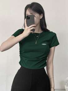 DAZY Camiseta de mujer de unicolor con estampado, cuello redondo y diseño de pliegues en la cintura, top corto para mujer en verano, Pascua - Verde - Ver 4