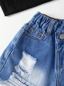 年轻女孩新款休闲时尚斜襟蓝色洗水牛仔短裤