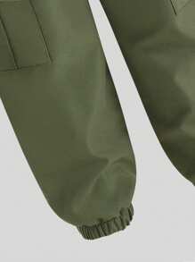 SHEIN Conjunto de 2 piezas para niñas preadolescentes con camiseta de cuello redondo de manga corta de unicolor y pantalones largos utilitarios
