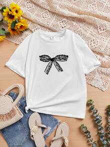 SHEIN Camiseta de manga corta y hombros caídos, corte informal, con diseño de lazo y encaje retro coreano, adecuada para niñas preadolescentes en verano