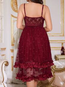 Camisón de talla grande con cuello en V profundo, decoración de moño y dobladillo doble