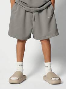 SUMWON Conjunto deportivo informal a juego para niños preadolescentes, compuesto por sudadera y pantalones cortos. Atuendo básico y esencial para actividades deportivas, entrenamiento, escuela y uso diario para niños de 8 a 16 años. - Gris Oscuro - Ver 4