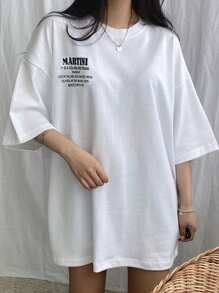 DAZY Camiseta suelta de verano para mujer, con estampado de eslogan, hombros caídos y cuello redondo. Es un cóctel transparente y sin color decorado con aceitunas después de mezclar vermut con ginebra. Camiseta oversize con estampa gráfica