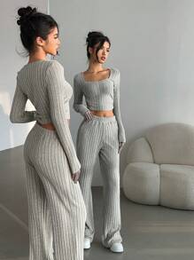 SHEIN Essnce Conjunto de 2 piezas informal de top corto de manga larga de punto acanalado y pantalones en unicolor para mujeres