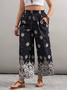 SHEIN LUNE Pantalones anchos con bolsillos y cintura con nudo con estampado floral para mujer de talla grande, conjunto para vacaciones