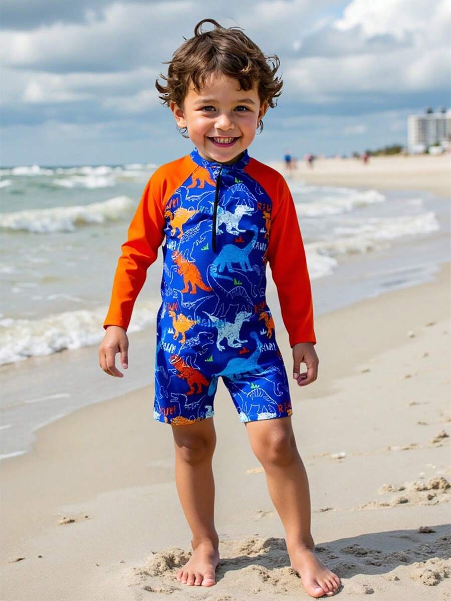 Bộ đồ bơi một mảnh in hình khủng long cho bé trai đi biển ngày lễ có tay áo Raglan - Nhiều màu - Xem 1