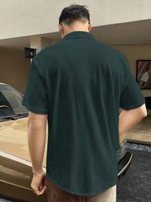 Manfinity Homme Camisa informal holgada de manga corta con botones de un solo color para hombres