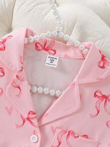 Set de 2 piezas de pijama informal para niña joven con cardigan de manga corta con decoración de lazo rosa y shorts