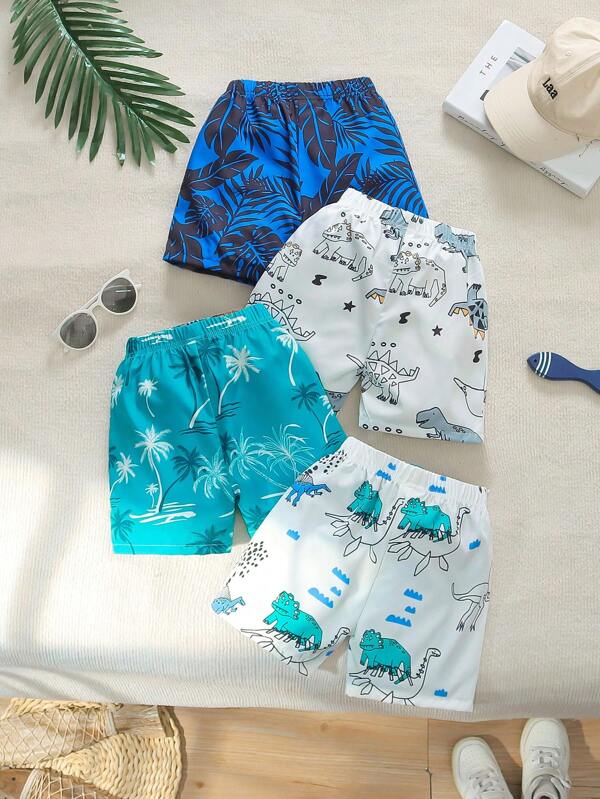 SHEIN 4 piezas Pantalones cortos informales deportivos para niño pequeño con estampado de dinosaurio y hojas de palma en todo el diseño, adecuados para uso diario, escuela, salidas, deportes, primavera y verano. Proporciona múltiples combinaciones para mostrar su apariencia cómoda y de moda