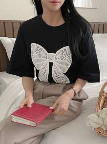 DAZY Women's Short Sleeve T-Shirt With Bowknot Design And Round Neck - Black - View 6