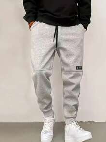 Manfinity Dauomo Pantalones casuales de hombre con cordón de color liso, de moda y sencillos