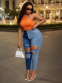 Plus Size Women's Asymmetric Color Block Elastic Jeans