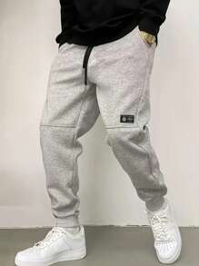 Manfinity Dauomo Pantalones casuales de hombre con cordón de color liso, de moda y sencillos