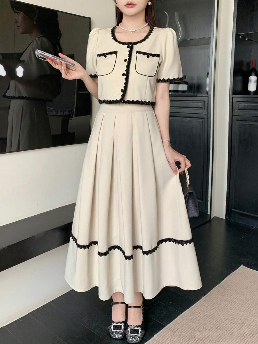 DAZY Bộ 2 món áo và chân váy nữ cổ tròn tay phồng cài cúc phía trước, phối ren tương phản, thanh lịch. - Màu be - Xem 1