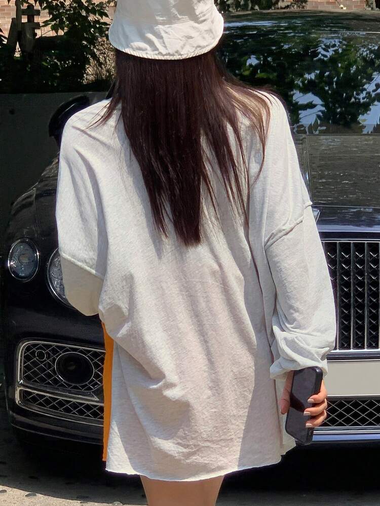 Camiseta oversize con gráfico de letra, abertura en el bajo y hombros caídos, manga larga, ropa de otoño para mujer