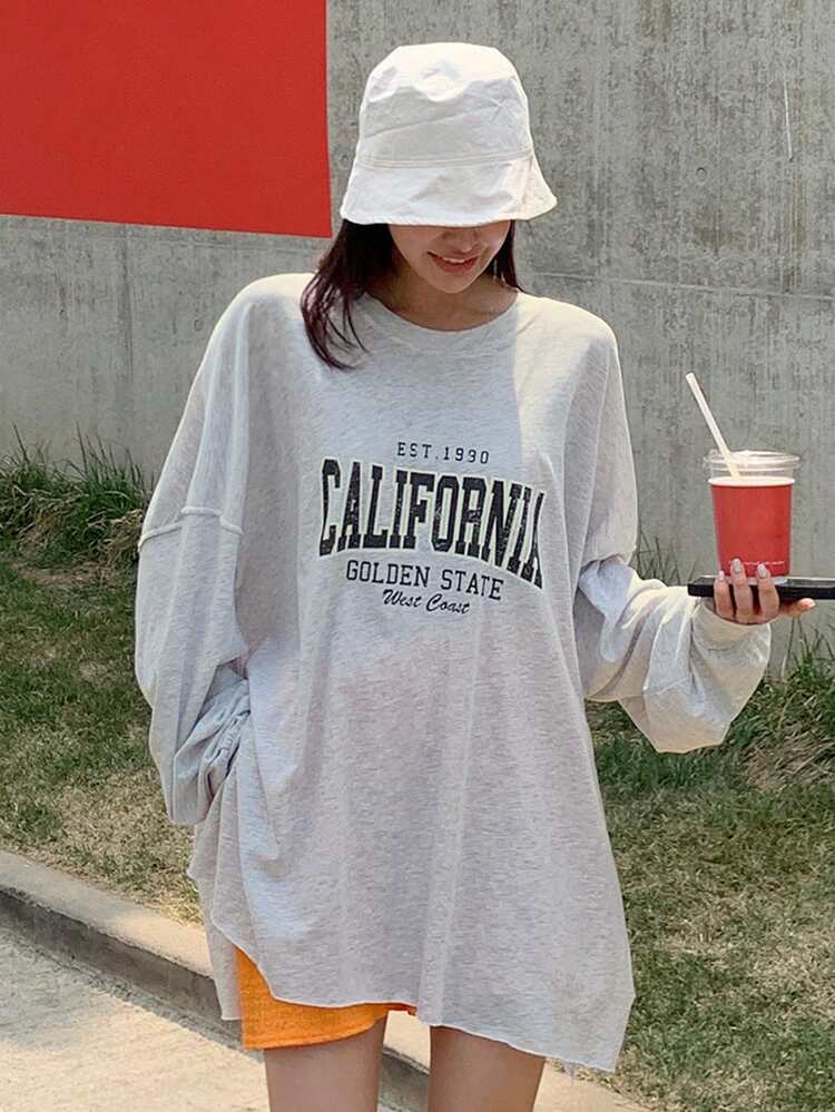 Camiseta oversize con gráfico de letra, abertura en el bajo y hombros caídos, manga larga, ropa de otoño para mujer