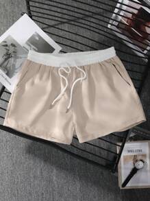 Manfinity Homme Pantalones cortos casuales con cordón en la cintura de corte holgado para hombres, ropa de hombre