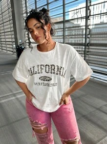 SHEIN EZwear 大码休闲宽松短袖印花白色 T 恤，夏季 / 夏季 / 夏季，春季 / 春季女士，海滩女士 / 海滩，女士早午餐，春假，音乐会女士 / 狂欢节 / 乡村音乐会 / 伊比沙岛 / 纳什维尔，女士春季 - 白色 - 查看 1