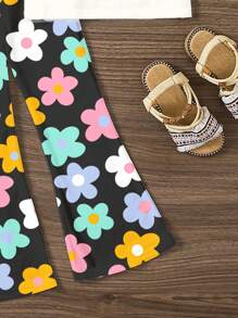 SHEIN Leap Crew 2 件套年轻女孩休闲卡通花朵图案圆领短袖上衣和喇叭裤套装，适合春夏季