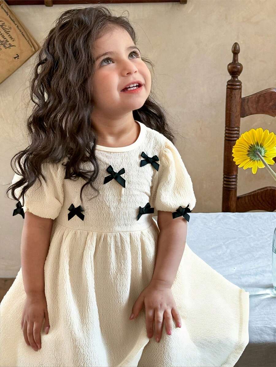 SHEIN LMoss Kids Abito estivo a maniche corte per bambine con decorazione fiocco carino - Albicocca - Visualizzare 1